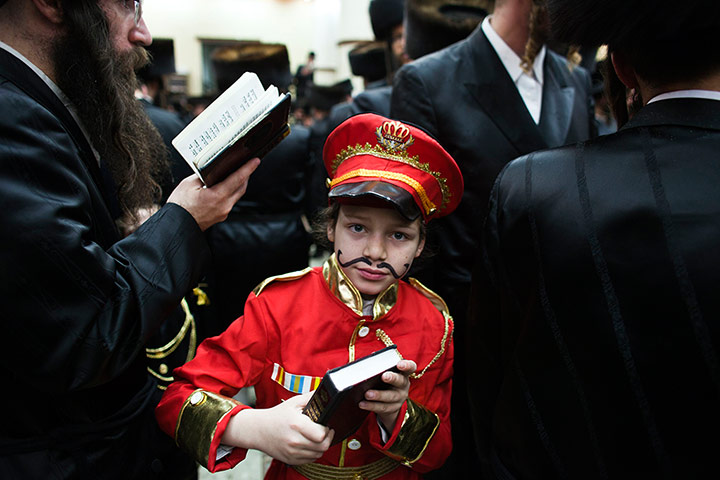 Purim gallery: A Jewish boy dressed in a special costume