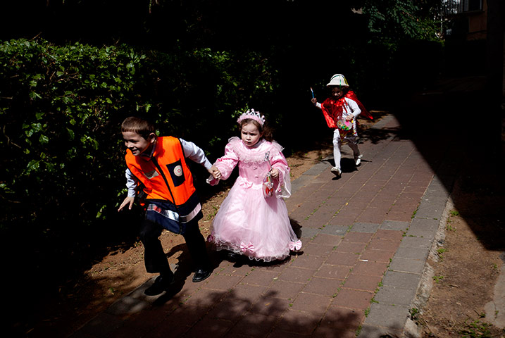 Purim gallery:  Jewish children dressed in costumes