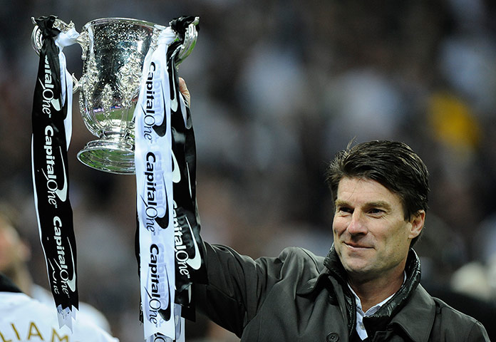 Capital One Final 7: Michael Laudrup gets a hand on the trophy