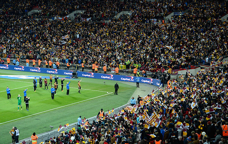 Capital One Final 7: Bradford's players applaud their fans after the match