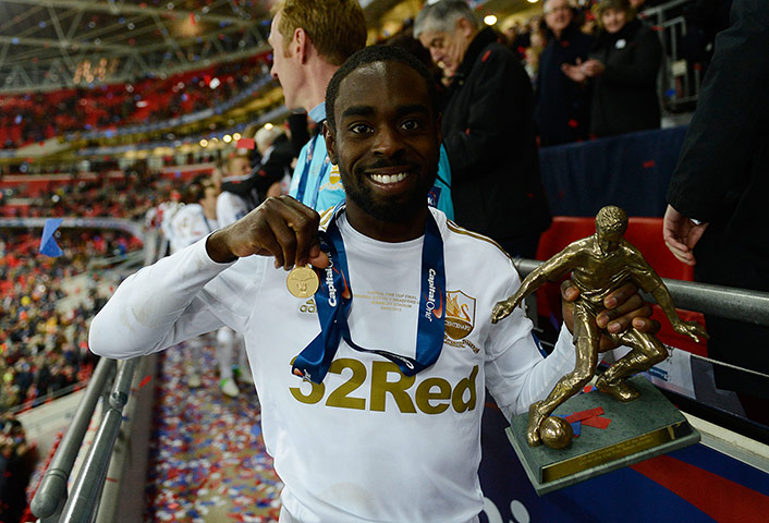 Capital One Final 7: Nathan Dyer with his man-of-the-match award and winner's medal