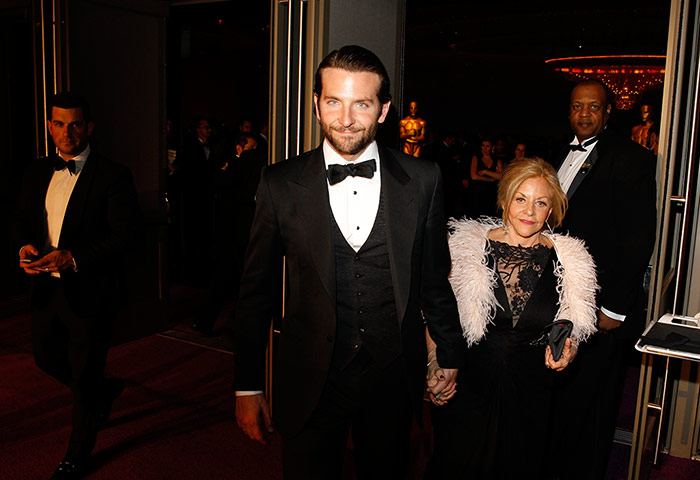 Oscars after party: Bradley Cooper arrives with his mother Gloria Cooper at the Governors Ball