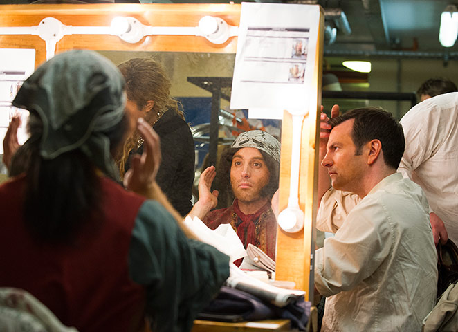 Carmen: Members of the chorus apply makeup backstage at the Royal Albert Hall