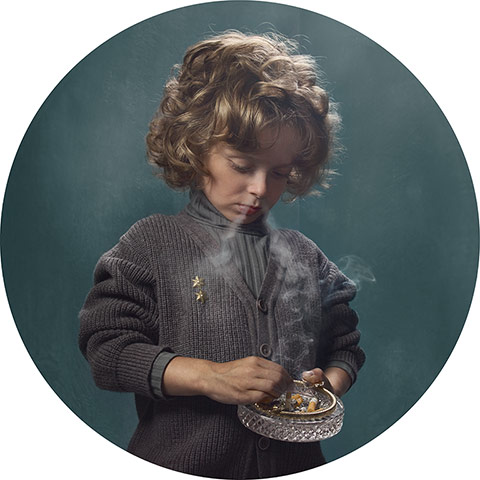 Big Pic - Smoking Kids: young boy with blond hair and jumper smoking 