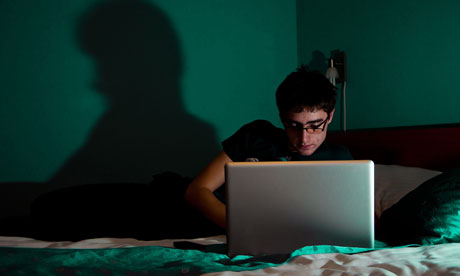 Teenage boy on computer