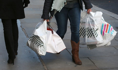 woman carrying shopping bags