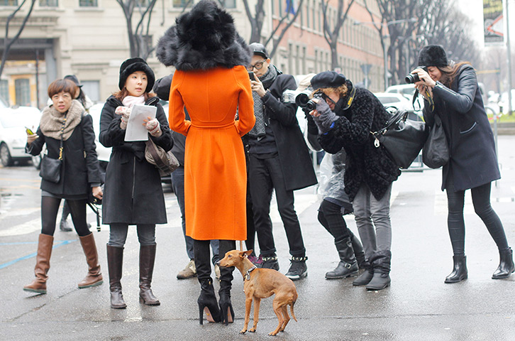24hours in pictures: Anna Dello Russo wearing a Marc Jacobs hat and coat at Milan Fashion Week