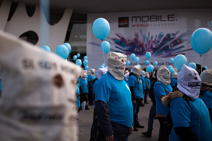 24hours in pictures: Demonstrators from the Telefonica phone company protest