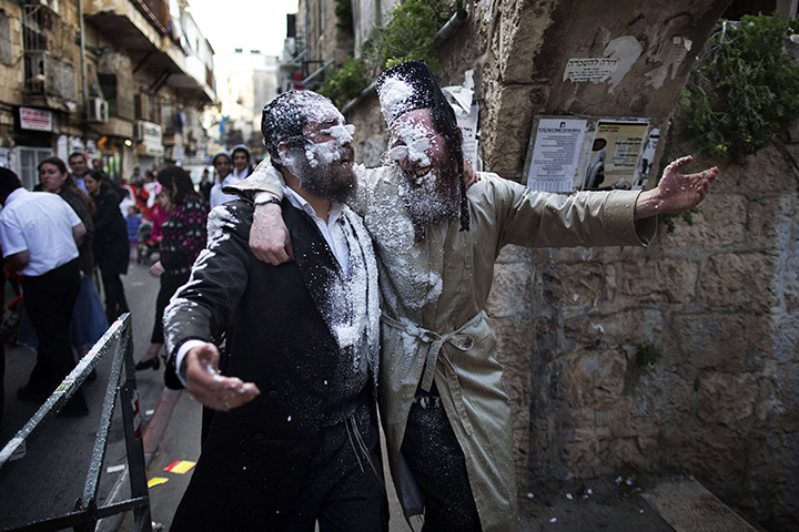 24hours in pictures: Ultra-Orthodox Jews celebrate the Jewish festival of Purim
