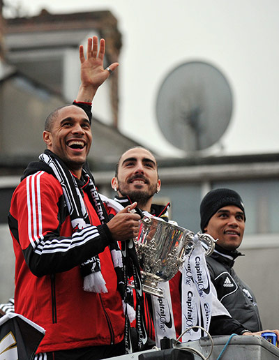 Swansea parade: Ashley Williams, Chico Flores and Michael Vorm 