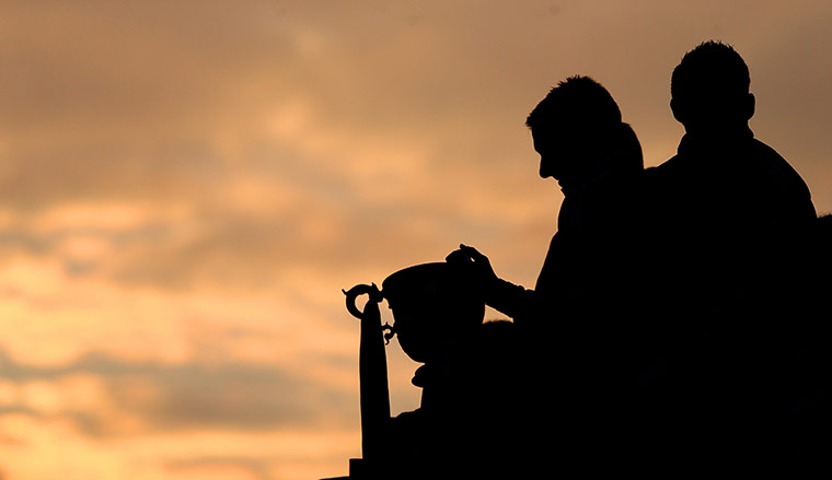 Swansea parade: Gary Monk gazes at the Capital One Cup on Swansea City Bus Parade