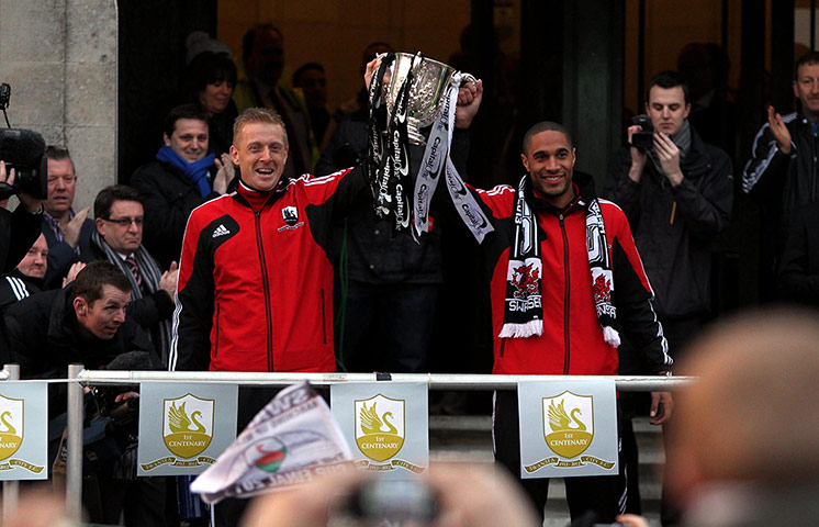 Swansea parade: Gary Monk and Ashley Williams on the Swansea City Bus Parade