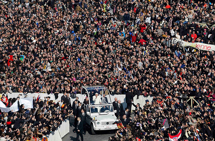 Pope Benedict XVI speech: Pope Benedict XVI inhis Popemobile as he rides through a packed Square