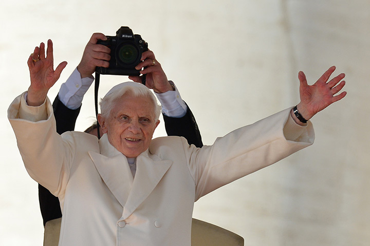 Pope Benedict XVI speech: Pope Benedict XVI waves from the altar