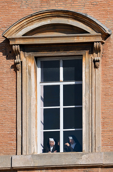 Pope Benedict XVI speech: nuns look from a window