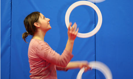 woman juggling rings
