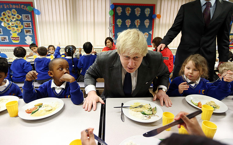 A lighter look: Boris Johnson joins children at the Reach Academy in Feltham for lunch