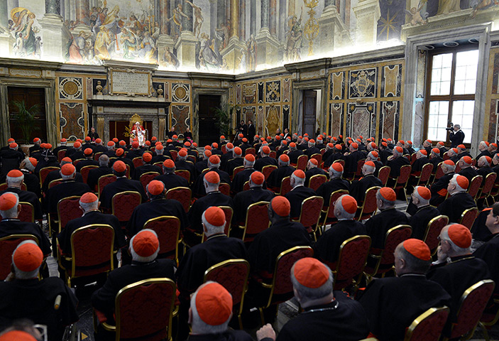 The Pope's last day: Pope Benedict XVI delivers his message at his farewell meeting to cardinals
