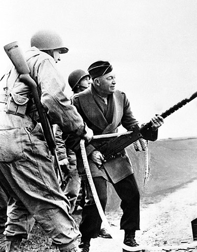 US presidents with guns: Eisenhower, Allied invasion chief, fires a Browning light machine gun