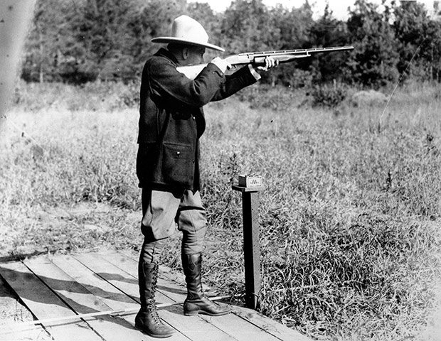 US presidents with guns: Calvin Coolidge shoots clay pigeons at his vacation home on the Brule