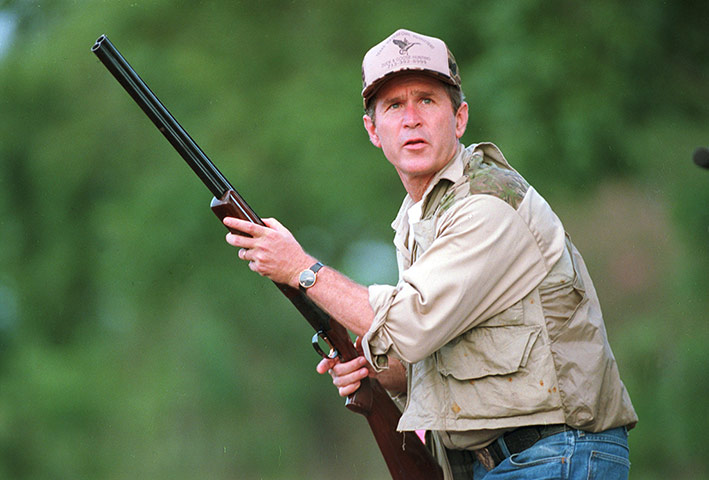 US presidents with guns: George W. Bush looks to the sky during a dove hunt in Hockley