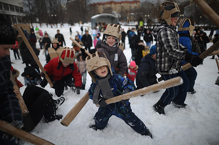 24 hours: Moscow, Russia: Children take part in cardboard tube fighting