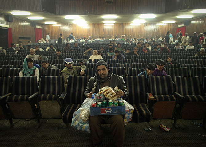 Sony World Professional: An employee of Cinema Pamir sells refreshments in Kabul