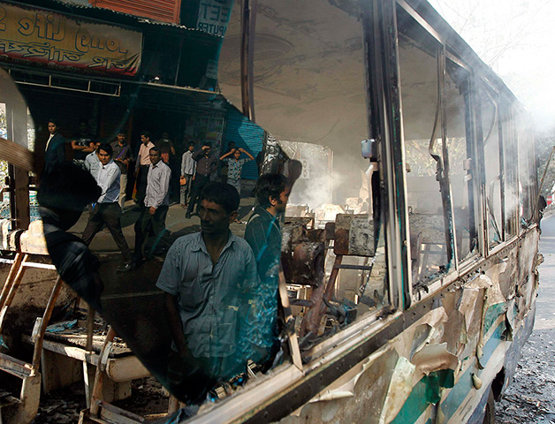 24 hours: Dhaka, Bangladesh: Bus burnt bus by activists