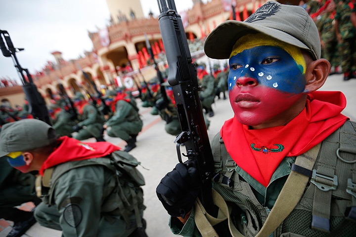24 hours: Caracas, Venezuela: Soldiers attend a military parade
