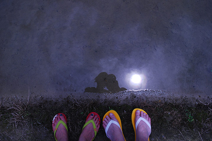 Your Pictures: Love: Couple reflected in water