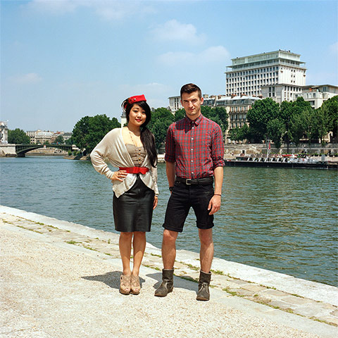 Big Picture - Hana Pesut: couple clothes swapping hana pesut switcheroo woman wearing leather skirt and cream cardigan with red belt man wearing checked shirt with denim shorts