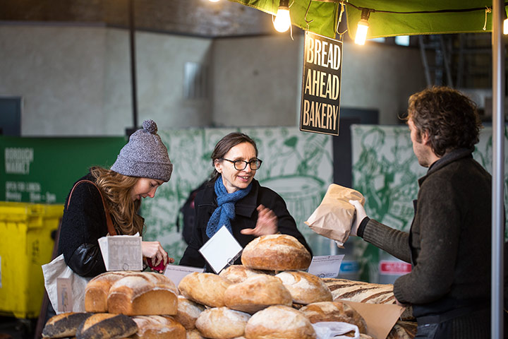 Borough Market: shopppers buying bread at brough market