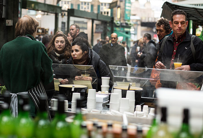 Borough Market: A brisk lunchtime crowd tries the soup at a stall in the market.