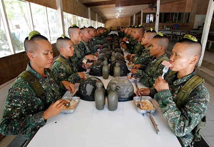 24 hours in pictures: Newly recruited female marines inside the marine headquarters Ternate