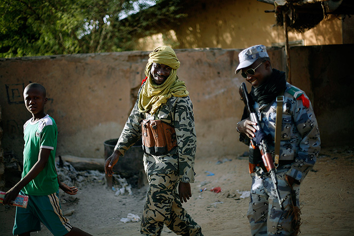 24 hours in pictures: Malian  soldiers patrol the streets of Gao