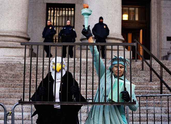 24 hours in pictures: Demonstrators stand outside the 2nd US Circuit Court of Appeals
