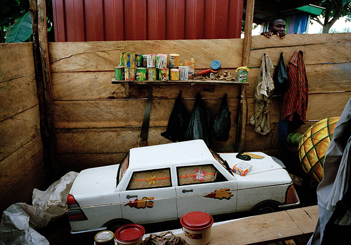 Coffins in Ghana: A coffin in the shape of a car in Accra, June 2005