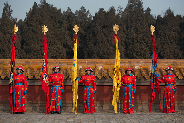 Lunar New Year: Performers take part in a traditional Qing dynasty ceremony, in which emperors prayed for good fortune, at the Temple of Earth park in Beijing 
