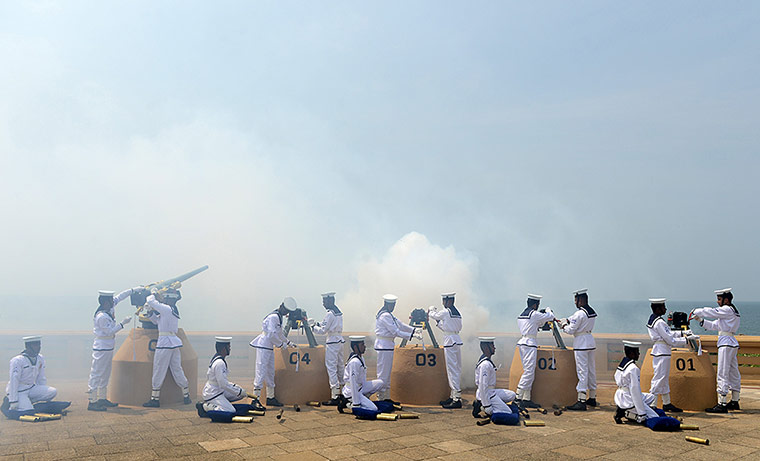 20 Photos: Sri Lankan Navy personnel fire a 21-gun