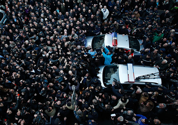 24 hours: Protestors scuffle outside the National Library in Tbilisi
