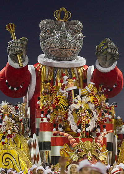 Carnival: Dancers in elaborate costumes, dance as they ride through the parade 