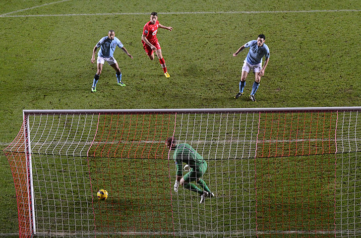 Saturday Prem matches: Gareth Barry of Manchester City scores an own goal
