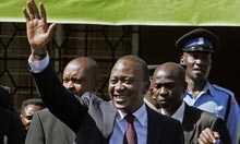 Uhuru Kenyatta waves to supporters following his election victory. Photograph: Hoss Njuguna/AFP/Getty Images Newly elected President Uhuru Kenyatta (