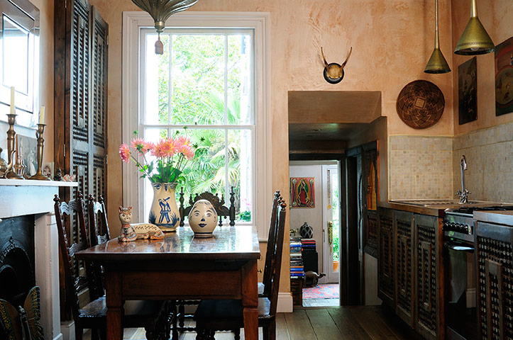 Homes - moroccan home: interior of wooden table in dining room