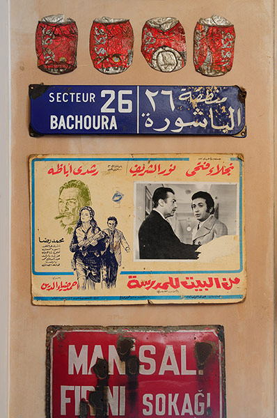 Homes - moroccan home: moroccan postcard and number plates on beige wall