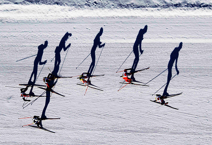 24 hours in pictures: Cross-country skiers race during the Engadin Ski Marathon 
