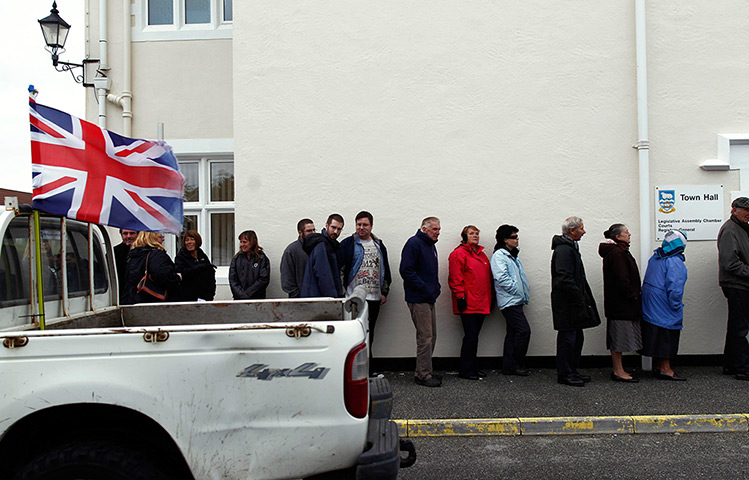 Falkland Islands: People line up to cast their votes at the Town Hall 