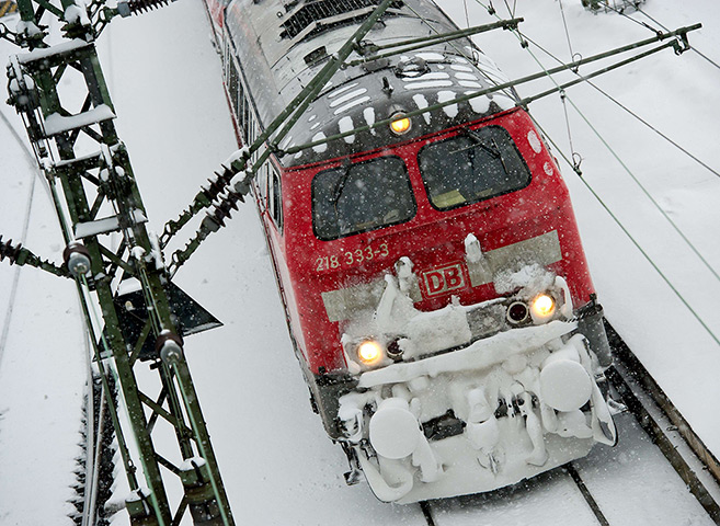 Europe snow: A Deutsche Bahn train makes its way through the snow 