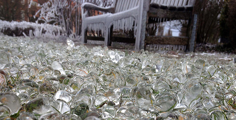 Europe snow: Spray from a fountain creates ice formations, Welwyn Garden City