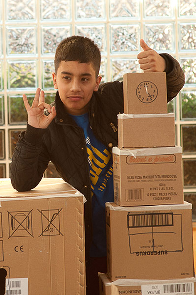 catalyst1: Boy with cardboard tower blocks
